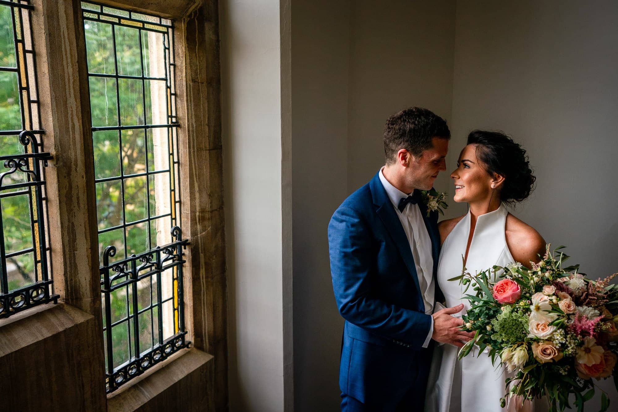 Wedding Portrait of couple on the stairs at Winchester Registry Office