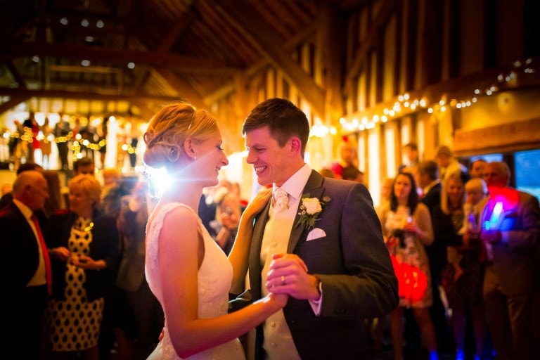 Fitzleroi Barn Wedding Photography First Dance. Sussex wedding photographers Carol & Paul