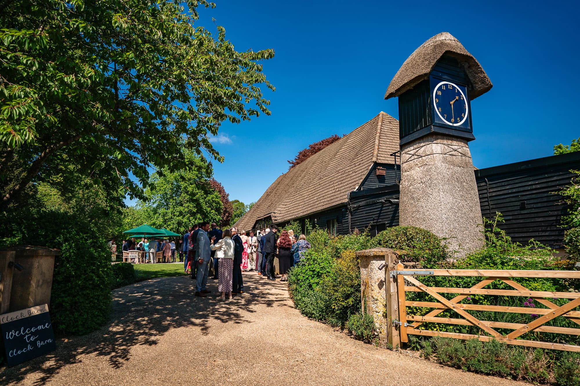 Clock Barn wedding guests waiting to enter the wedding ceremony